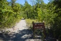 Information board with arrow and volcan word pointing direction of the hiking trail to the Osorno Volcano Royalty Free Stock Photo