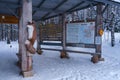 Information board and entrance in Lapinsalmi to Repovesi National Park in winter. Kouvola, Finland