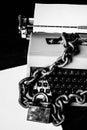 Information censorship - Typewriter locked with a chain