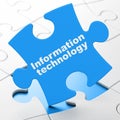 Information concept: Information Technology on puzzle background