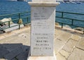 Information on pedestal of sculpture of Saint Margherite of Antioch, patron saint of the city of Santa Margherita Ligure, Italy