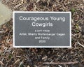 Information plaque for `Courageous Young Cowgirls` by artist Sherry Wolfenbarger Cagan in 2020 in Fort Worth, Texas.