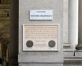 Information plaque at the entrance to the Galleria Vittorio Emanuele II in Milan, Italy`s oldest shopping mall.