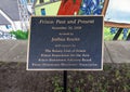 Information plaque for `Frisco, Past and Present` by artist Joshua Boulet beside Gazebo Park in historical downtown Frisco, Texas.