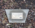 Information plaque for `The Great Mystery` by Anita Pauwels, public art in Frisco, Texas. Royalty Free Stock Photo