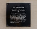 Information plaque for `The Navigator`, a hand-carved sculpture by Reems Mitchell courtesy of Crazy Shirts Hawaii on Maui.