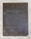 Information plaque for a sculpture of a trail boss cowboy sitting on a horse by Robert Summers in Plano, Texas.
