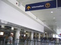 Information sign and baggage checking at airport Royalty Free Stock Photo