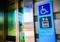 Information sign at the lift or elevator for disabled or people to a concourse of a railway station. Royalty Free Stock Photo