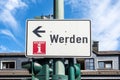 Information sign pointing to the Werden - district in the south of the city of Essen and Tourist information point in NRW, Germany Royalty Free Stock Photo