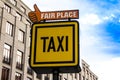 Information sign of a Taxi and Fair place on the background of houses in Prague Royalty Free Stock Photo