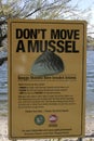 Information sign warning of the danger of the Dreissena polymorpha mollusk entering the lake zebra mollusk