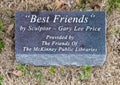 Information stone for a bronze sculpture titled `Best Friends` by Gary Lee Price Studios in McKinney, Texas.