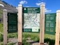 The informational sign for Red Rock Canyon in Waterton Park, AB Canada