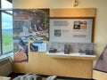 An informational sign telling about the excavating of the dinosaurs at Dinosaur National Monument near Vernal, Utah in the USA