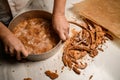 Chef crafting cake layers with iron mold Royalty Free Stock Photo