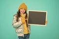 Informing kids community. Kid with blackboard. Promoting product. Child promoting event. Promotion concept. Kid cheerful
