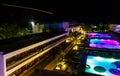 Infrastructure of the resort European hotel night, stairs, tables, bar, palm trees, the concept of summer holidays . Greece Royalty Free Stock Photo