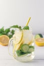 Infused Water With Lemon Cucumber and Mint on Wooden Background Detox Water Vertical Lemonad Royalty Free Stock Photo