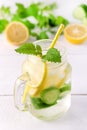 Infused Water With Lemon Cucumber and Mint on Wooden Background Detox Water Vertical Lemonad Royalty Free Stock Photo