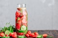 Infused Water with Strawberry, Cucumber and Thyme. Royalty Free Stock Photo