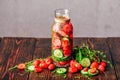 Infused Water with Strawberry, Cucumber and Thyme. Royalty Free Stock Photo