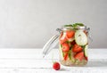 Infused water with strawberry and meloncella that is hybrid of cucumber and melon, thyme, mint. Copy space. Royalty Free Stock Photo