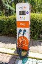 ING e-on Drive - charging for an electric car in the center of a street in Warsaw. Charging station in the parking lot