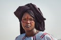 Fulani girl in traditional turban close up