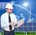 ingenieur works in the energy industry - environmentally friendly power generation with alternative energies such as wind and sol