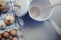 Ingredient in the kitchen with sunlight from the window. Close up view of ingredients of fried egg and vintage pot.