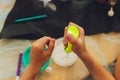 Ingredient for make home made Toy Called Slime, Teenager having fun and being creative homemade slime. Selective focus