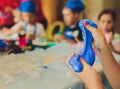 Ingredient for make home made Toy Called Slime, Teenager having fun and being creative homemade slime. Selective focus