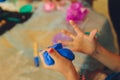 Ingredient for make home made Toy Called Slime, Teenager having fun and being creative homemade slime. Selective focus Royalty Free Stock Photo