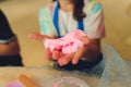 Ingredient for make home made Toy Called Slime, Teenager having fun and being creative homemade slime. Selective focus Royalty Free Stock Photo