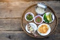 Ingredient for thai food,Thai favourites,Khantoke on wooden background,food on the mountain in the north, Chiang Mai,Thailand