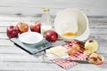 Ingredients for apple pie, apples, butter, eggs, flour, milk and sugar Royalty Free Stock Photo