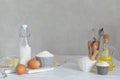 Ingredients for bakery butter flour, milk, oil, eggs, sugar, kitchen accessories Royalty Free Stock Photo