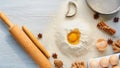 Ingredients for baking cake and accessories with copy space: rolling pin, eggs, ginger, anise stars, cinnamon and bakewares