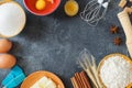 Ingredients for baking a cake at home. Flour and sugar, eggs with butter, spices on a dark brutal table Selective focus Royalty Free Stock Photo