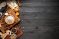 Ingredients for baking ginger cookies on a rustic wooden background