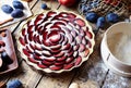 Ingredients for baking a homemade plum pie zwetschgendatschi. Rustic style. Royalty Free Stock Photo