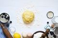 Ingredients for baking on the kitchen table. The process of making tarte Royalty Free Stock Photo