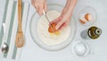 Ingredients for baking needs close up on light grey background. Woman`s hands add eggs into a bowl Royalty Free Stock Photo