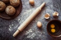 Ingredients for baking rye buns, rolling pin, eggs, flour, mixer on gray background 2 Royalty Free Stock Photo