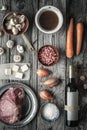 Ingredients for Boeuf Bourguignon on the old wooden table top view Royalty Free Stock Photo
