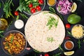 Ingredients for burritos wraps with beef and vegetables on black background Royalty Free Stock Photo