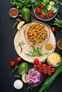 Ingredients for burritos wraps with beef and vegetables on black background Royalty Free Stock Photo