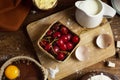 Ingredients for a coca de cireres, a cherry cake