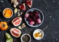 Ingredients for cooking beet and ginger detox elixir. On a dark background Royalty Free Stock Photo